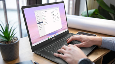 Unrecognisable male architect using laptop at home while working